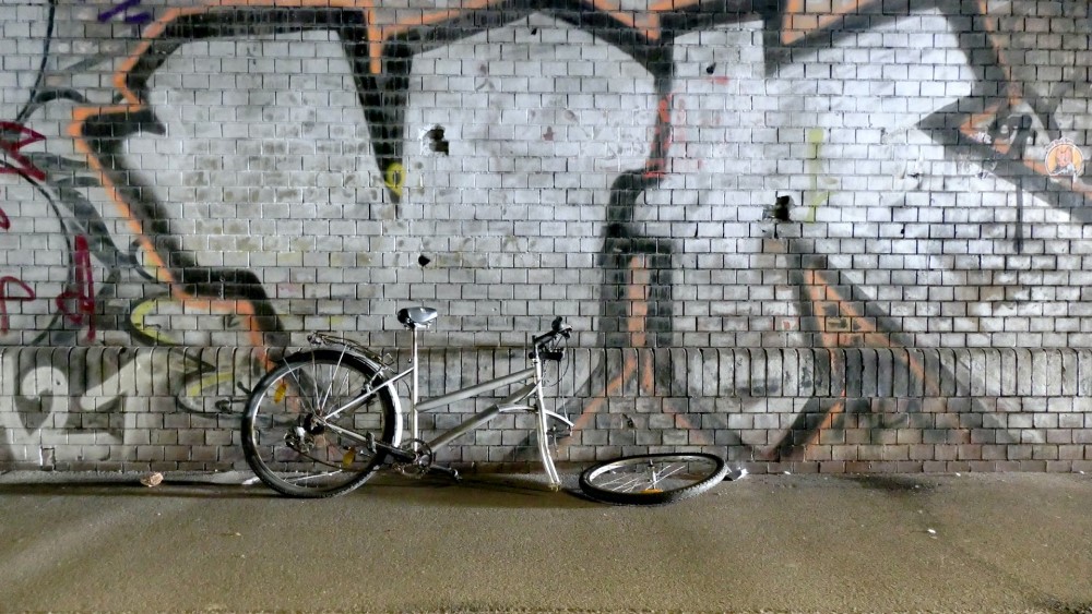 graffiti with broken bicycle