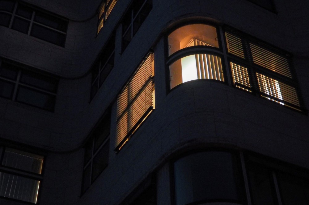 apartment with lights on at night